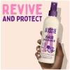 A picture of leave on conditioner  Bottle held in hand, with a text: revive and protect.