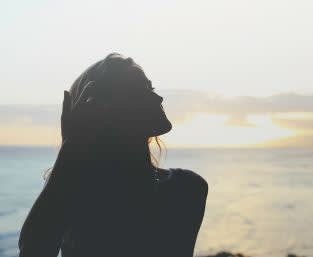 Picture of a woman during sunset