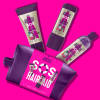Aussie SOS Hair aid (shampoo, conditioner, deep treatment bottles and a pink bag)