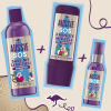 An image of 3 different Aussie products on the beige background with blue contour and a purple doodle between them 